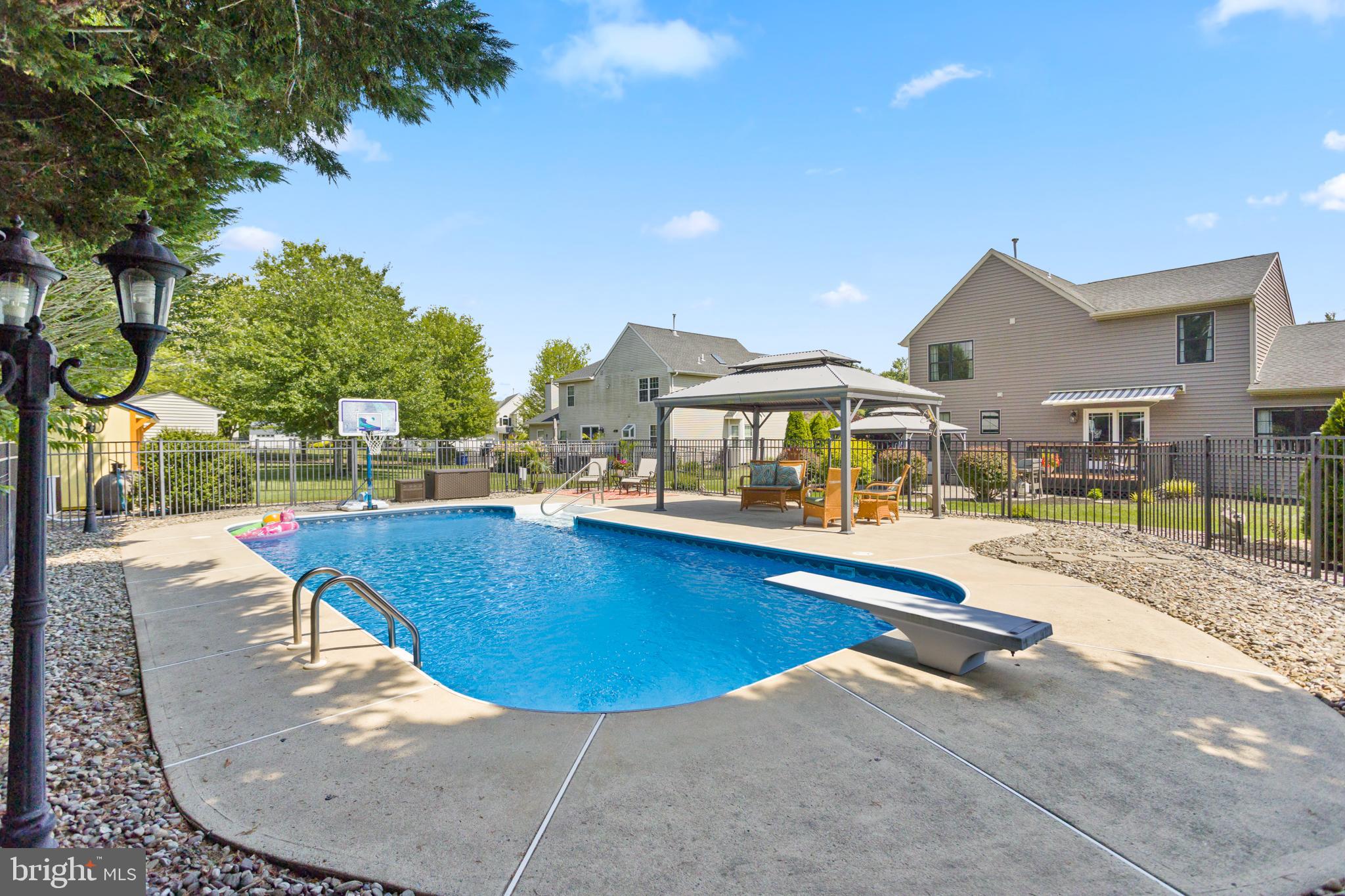 34 Valley Forge Road Bordentown, NJ 08505 - Photo 47 of 56 a view of a swimming pool with lounge chair
