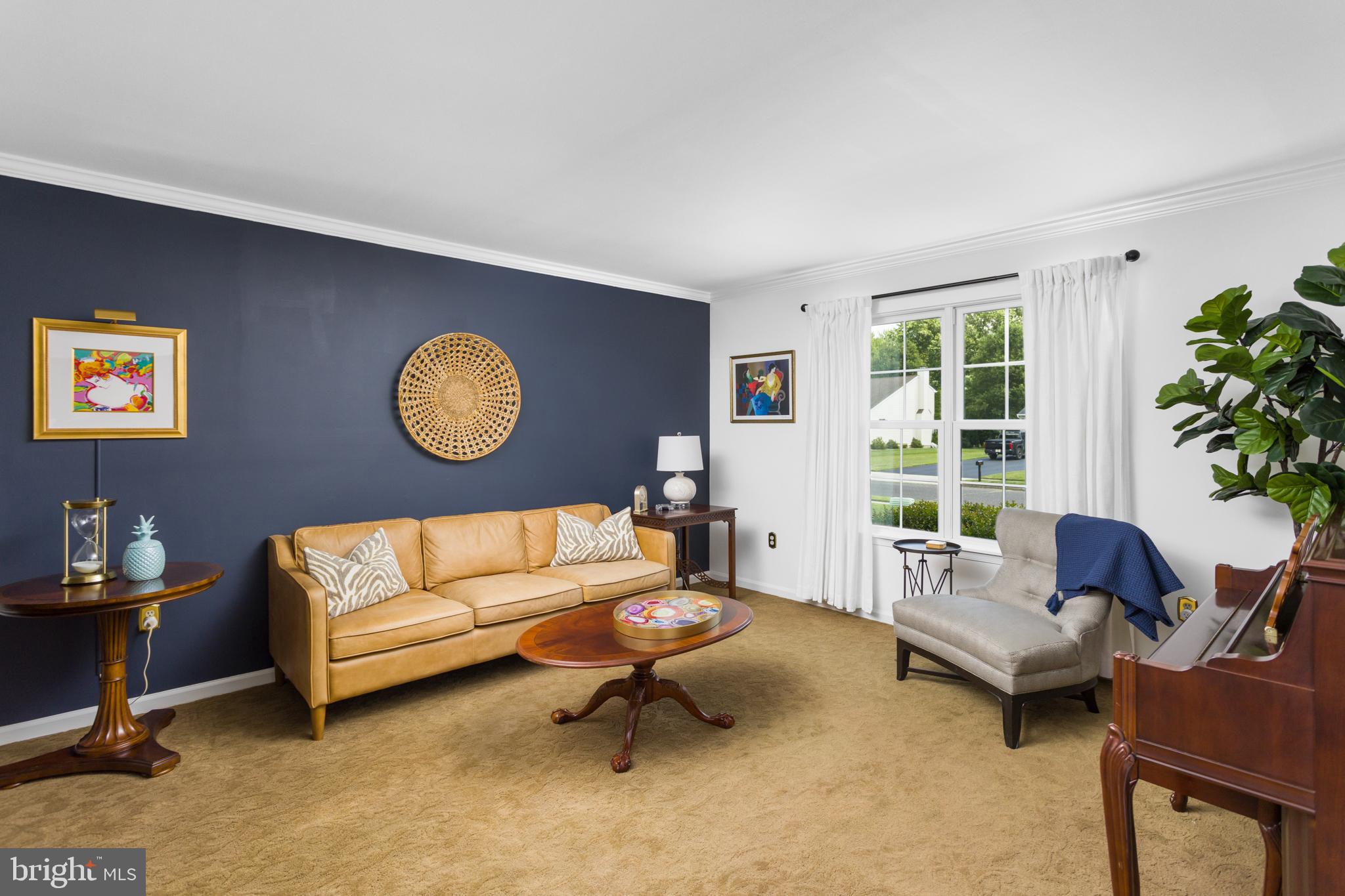 34 Valley Forge Road Bordentown, NJ 08505 - Photo 9 of 56 a living room with furniture and a large window