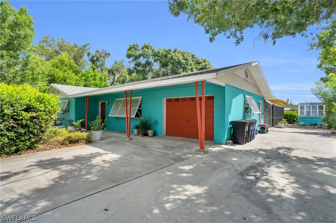 18639 Evergreen Road Fort Myers, FL 33967 - Photo 1 of 33 a view of a house with a patio
