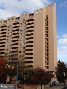 a front view of a building with glass windows