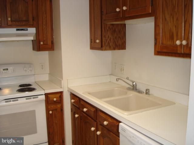 1301 North Courthouse Road, Unit 1109 Arlington, VA 22201 - Photo 13 of 20 a kitchen with a sink and cabinets