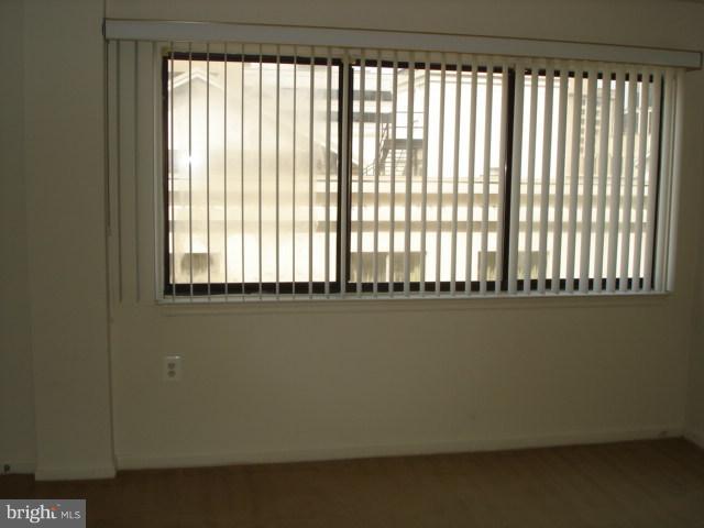 1301 North Courthouse Road, Unit 1109 Arlington, VA 22201 - Photo 17 of 20 a view of a room with a large window
