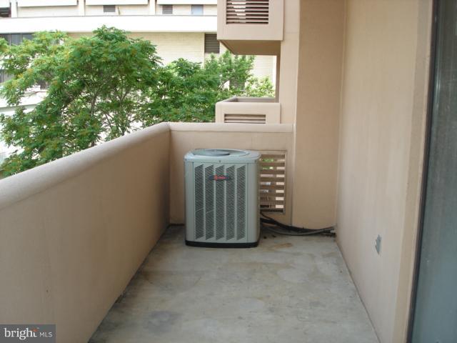1301 North Courthouse Road, Unit 1109 Arlington, VA 22201 - Photo 8 of 20 a view of a floor to ceiling window and an outdoor view