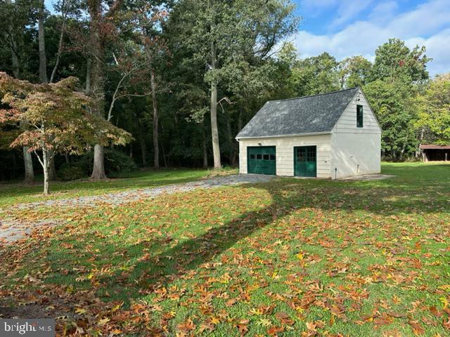 21800 Peach Tree Road Dickerson, MD 20842 - Photo 15 of 18 a front view of a house with garden
