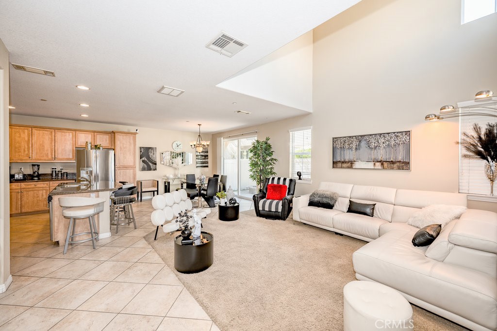 3631 Dunkirk Drive Oxnard, CA 93035 - Photo 3 of 16 a living room with lots of furniture and white walls