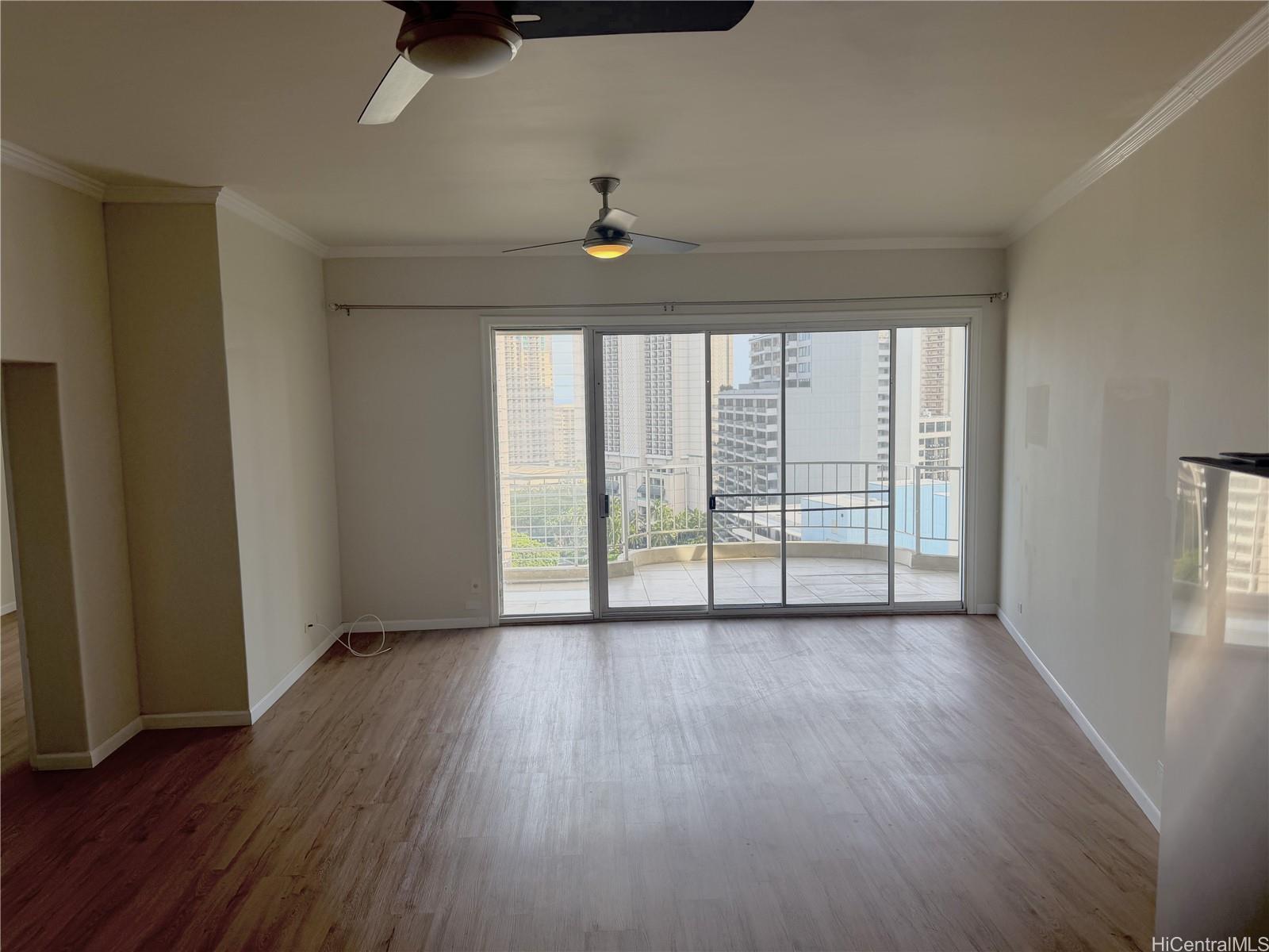469 Ena Road, Unit 2103 Honolulu, HI 96815 - Photo 6 of 22 Living Room is large with lots of space and excellent city views.