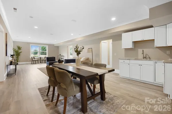 a view of a dining room with furniture