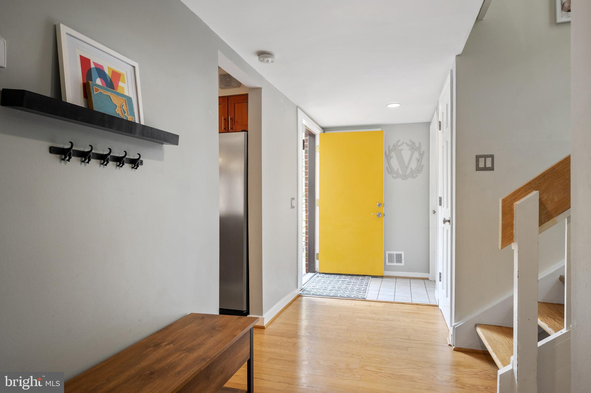 11720 Indian Ridge Road Reston, VA 20191 - Photo 4 of 68 Foyer leads into home with kitchen on the right
