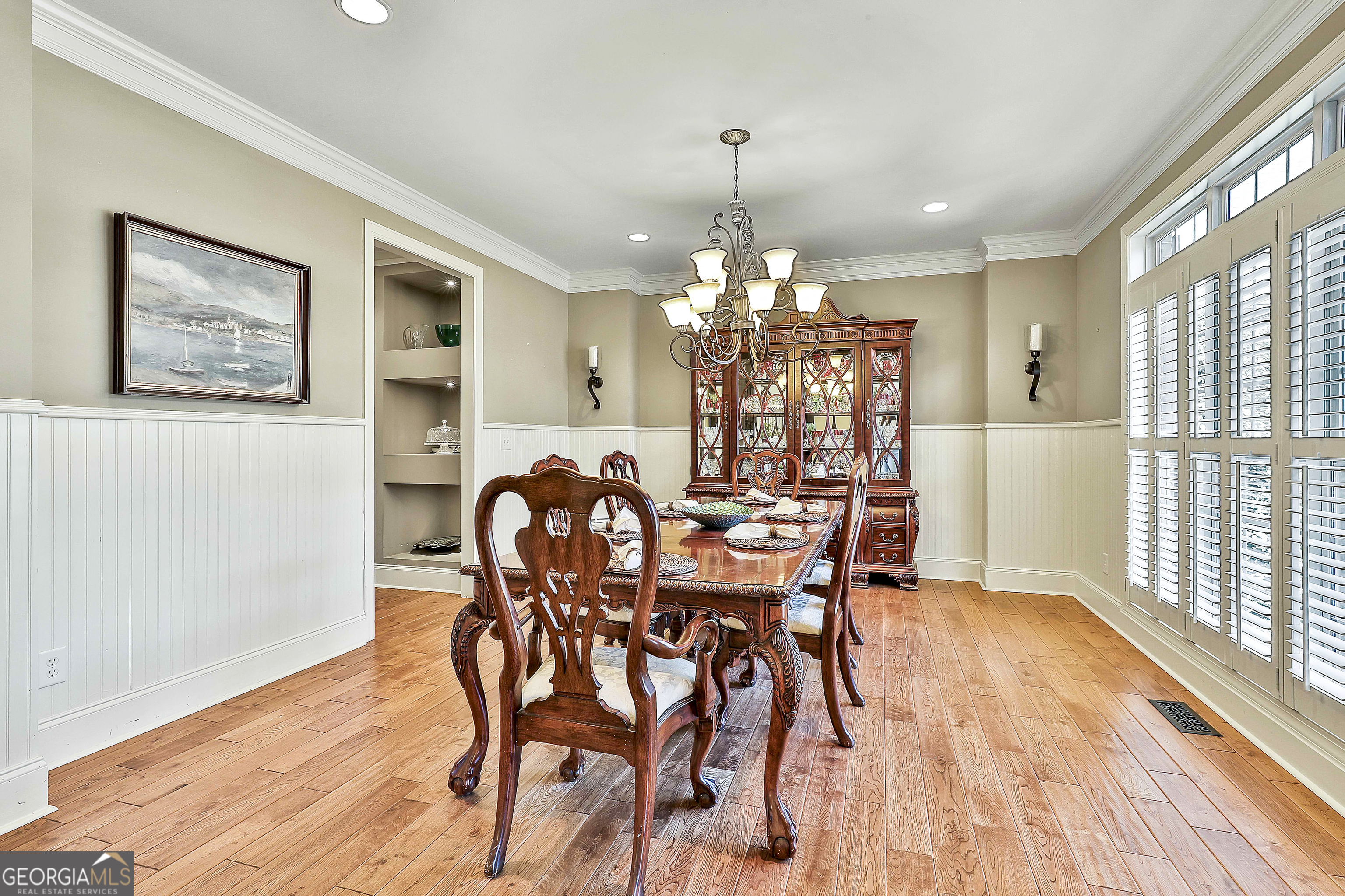 35 Fern Leaf Way Newnan, GA 30265 - Photo 13 of 112 a view of a dining room with furniture wooden floor and chandelier