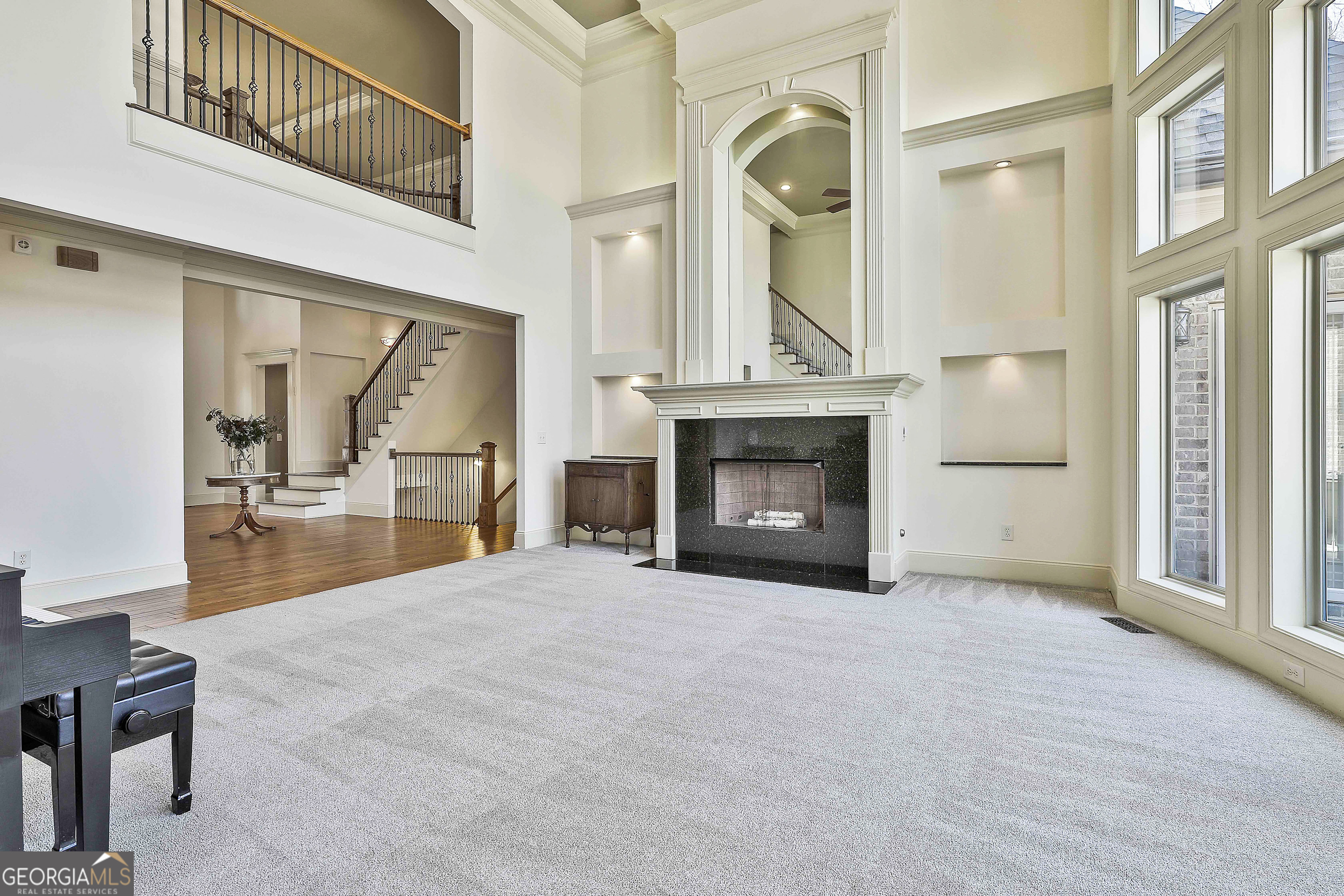 35 Fern Leaf Way Newnan, GA 30265 - Photo 20 of 112 a view of an empty room with a fireplace and a window