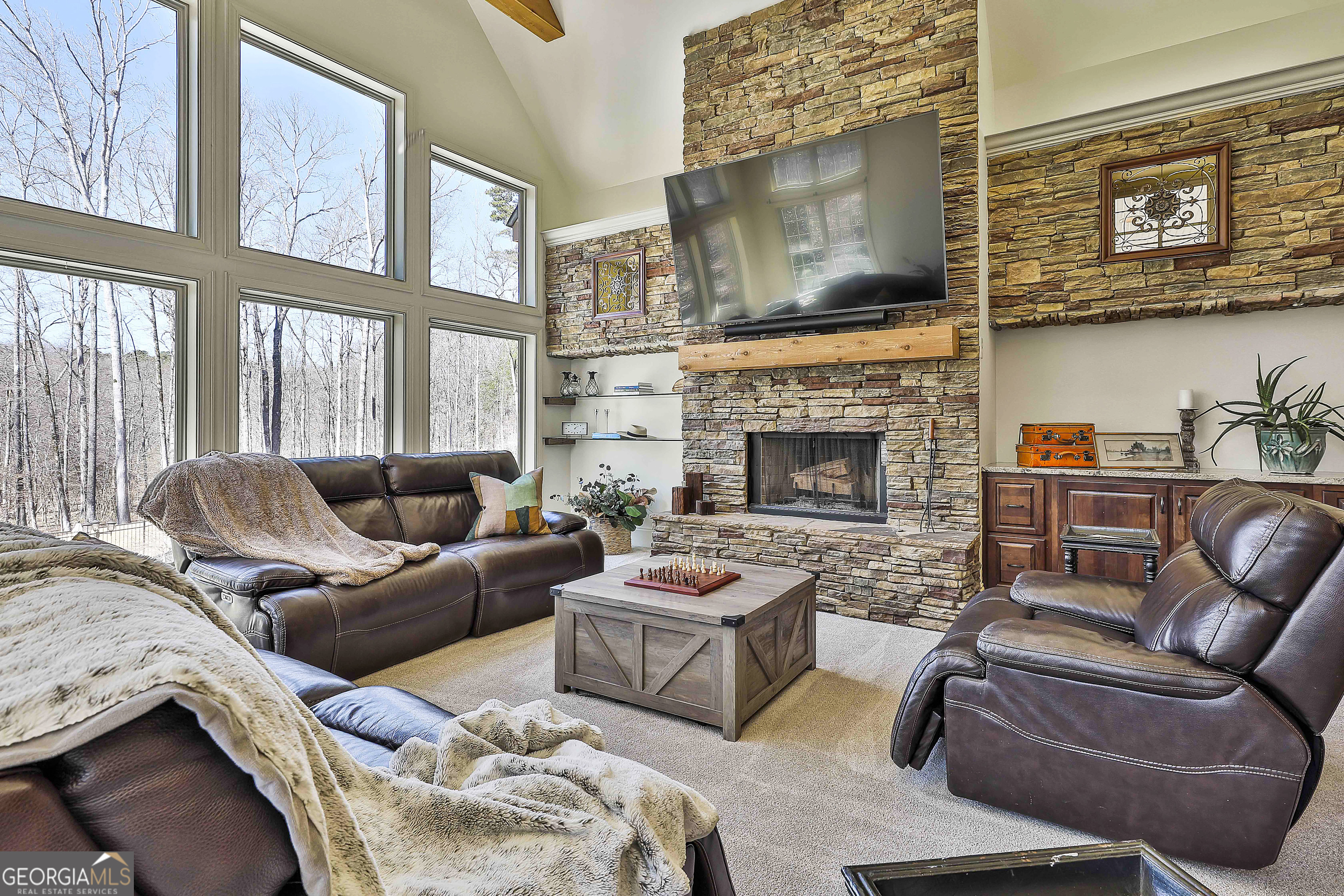 35 Fern Leaf Way Newnan, GA 30265 - Photo 24 of 112 a living room with furniture fireplace and flat screen tv
