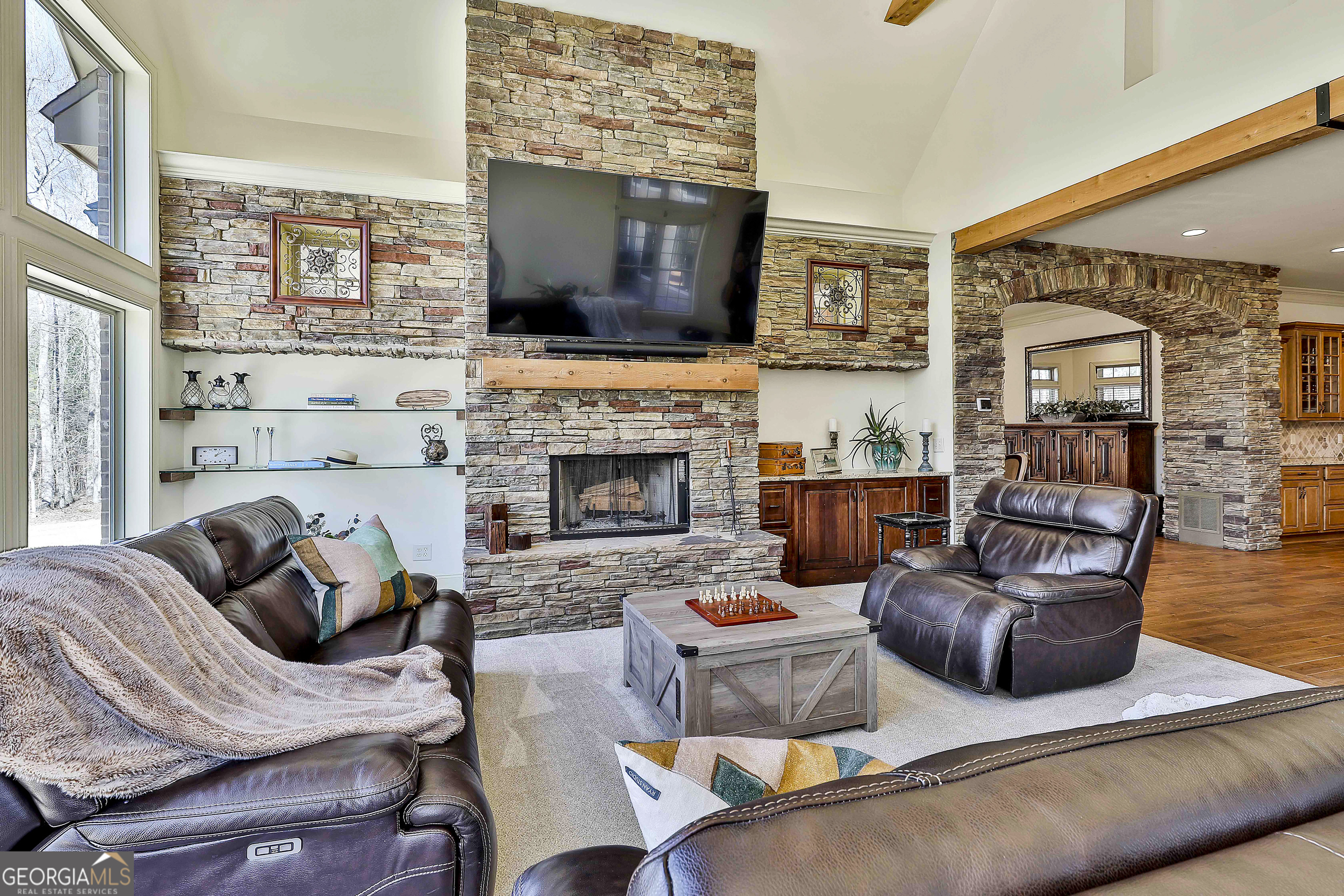 35 Fern Leaf Way Newnan, GA 30265 - Photo 26 of 112 a living room with furniture flat screen tv and a fireplace