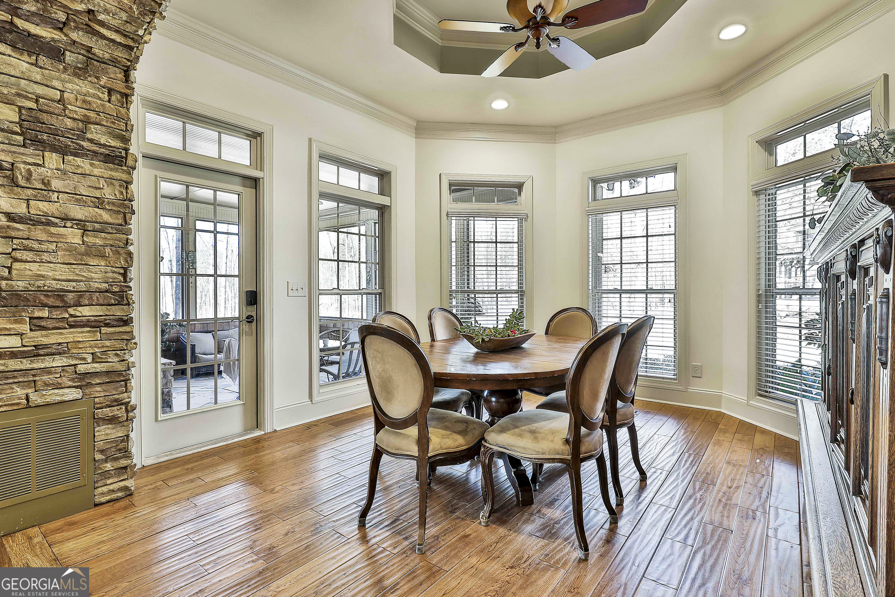 35 Fern Leaf Way Newnan, GA 30265 - Photo 40 of 112 a view of a a dining room with furniture window and wooden floor