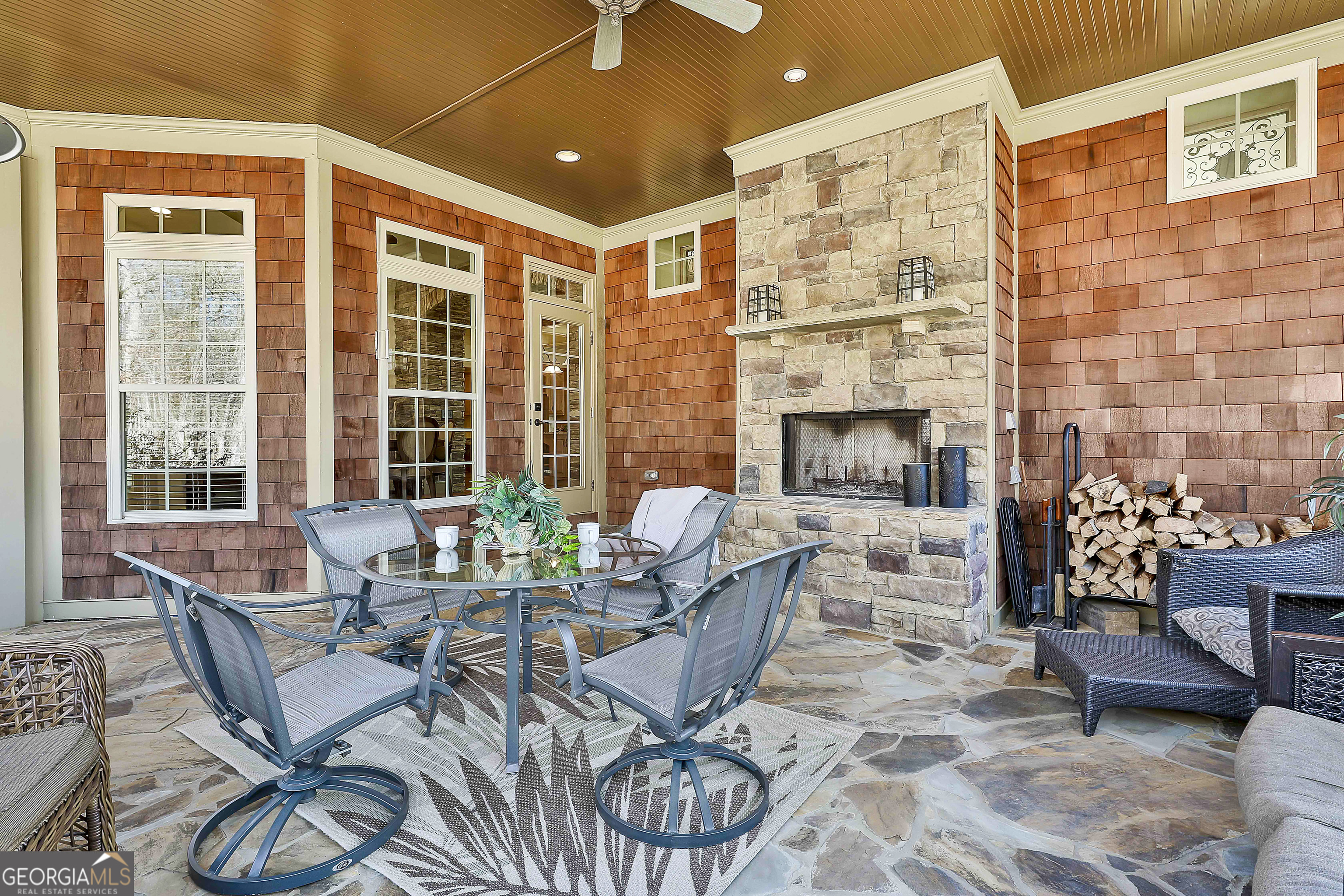 35 Fern Leaf Way Newnan, GA 30265 - Photo 43 of 112 a outdoor space with patio the couches and a fireplace