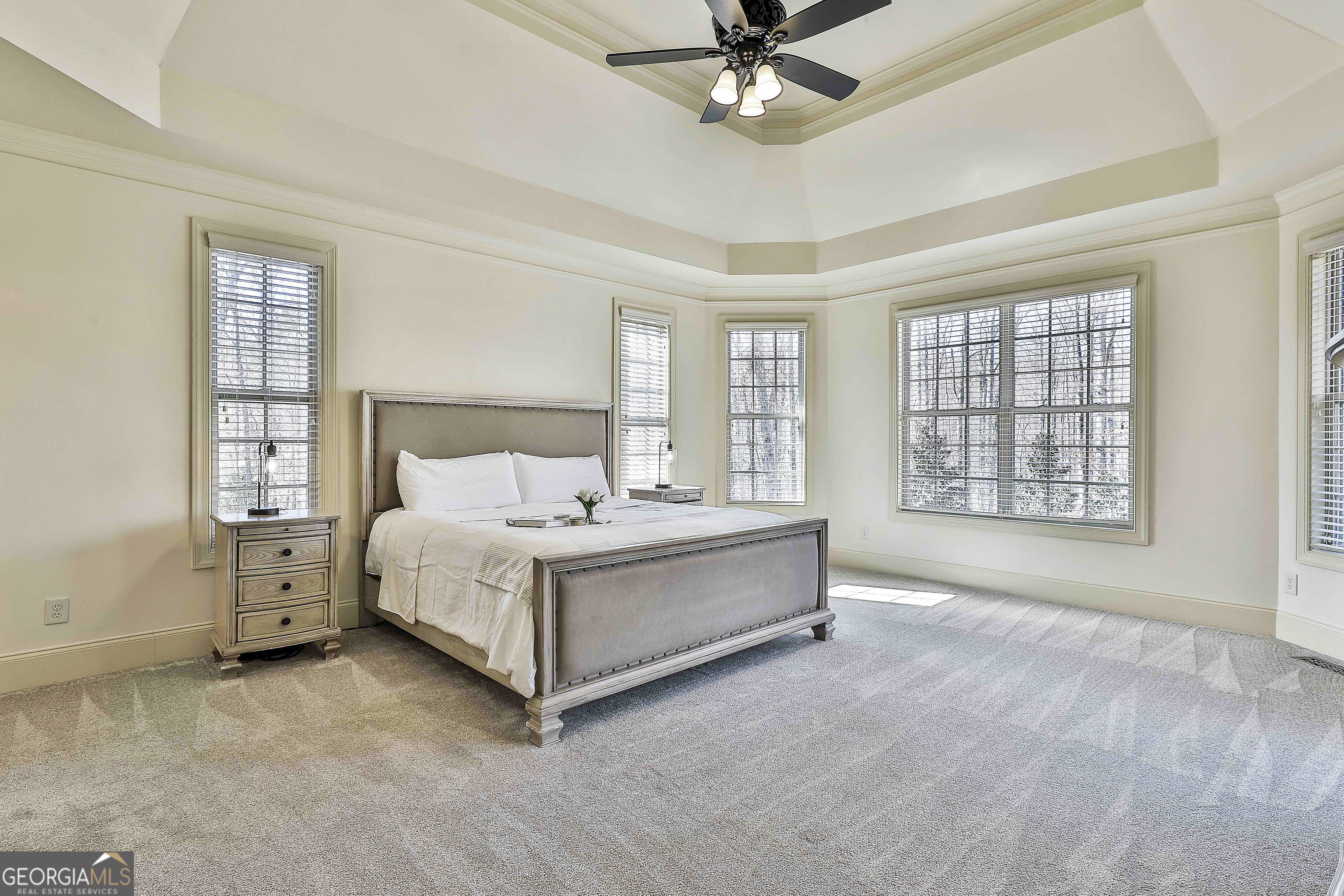 35 Fern Leaf Way Newnan, GA 30265 - Photo 47 of 112 a spacious bedroom with a bed and a window