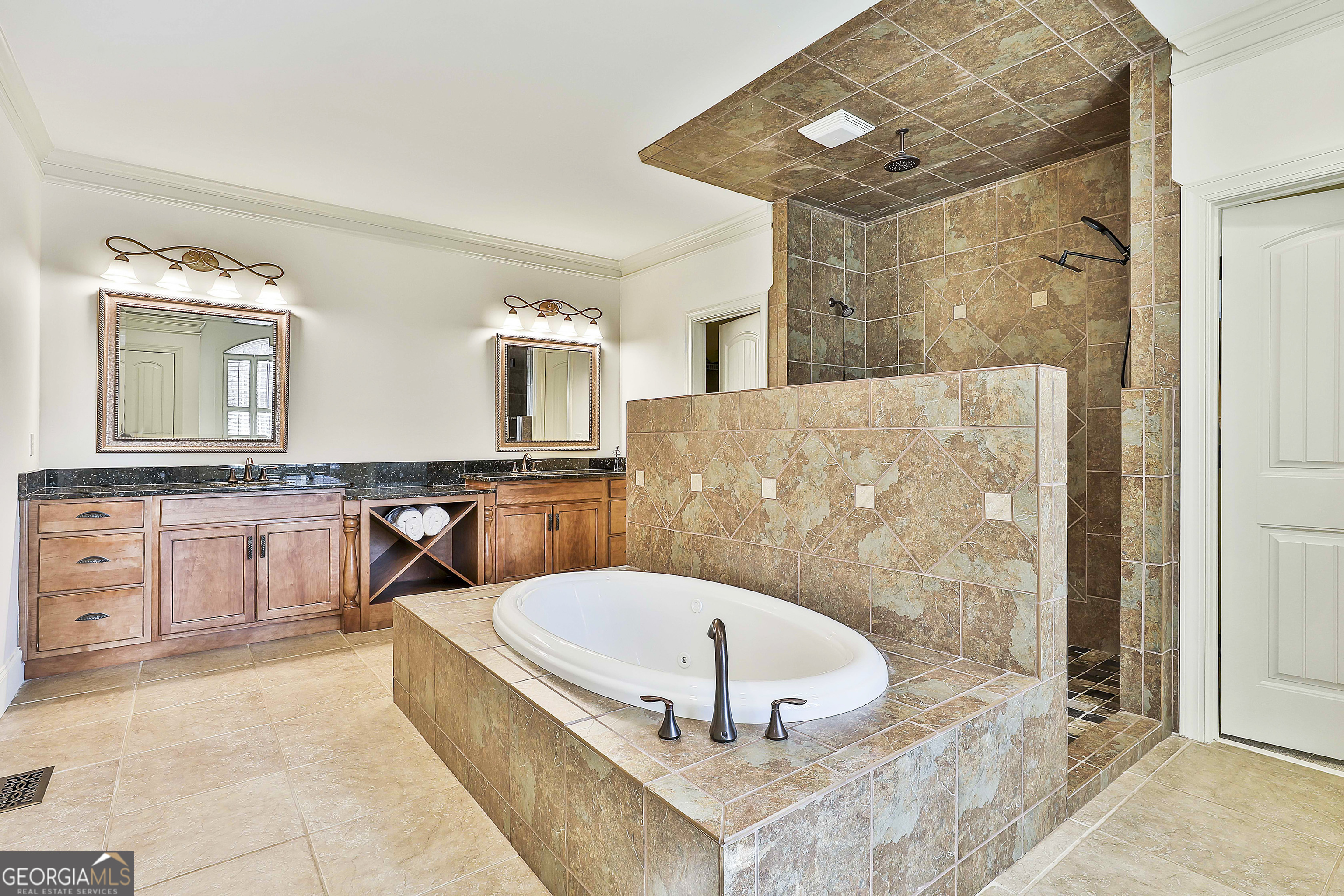 35 Fern Leaf Way Newnan, GA 30265 - Photo 53 of 112 a bathroom with a tub a sink and a mirror