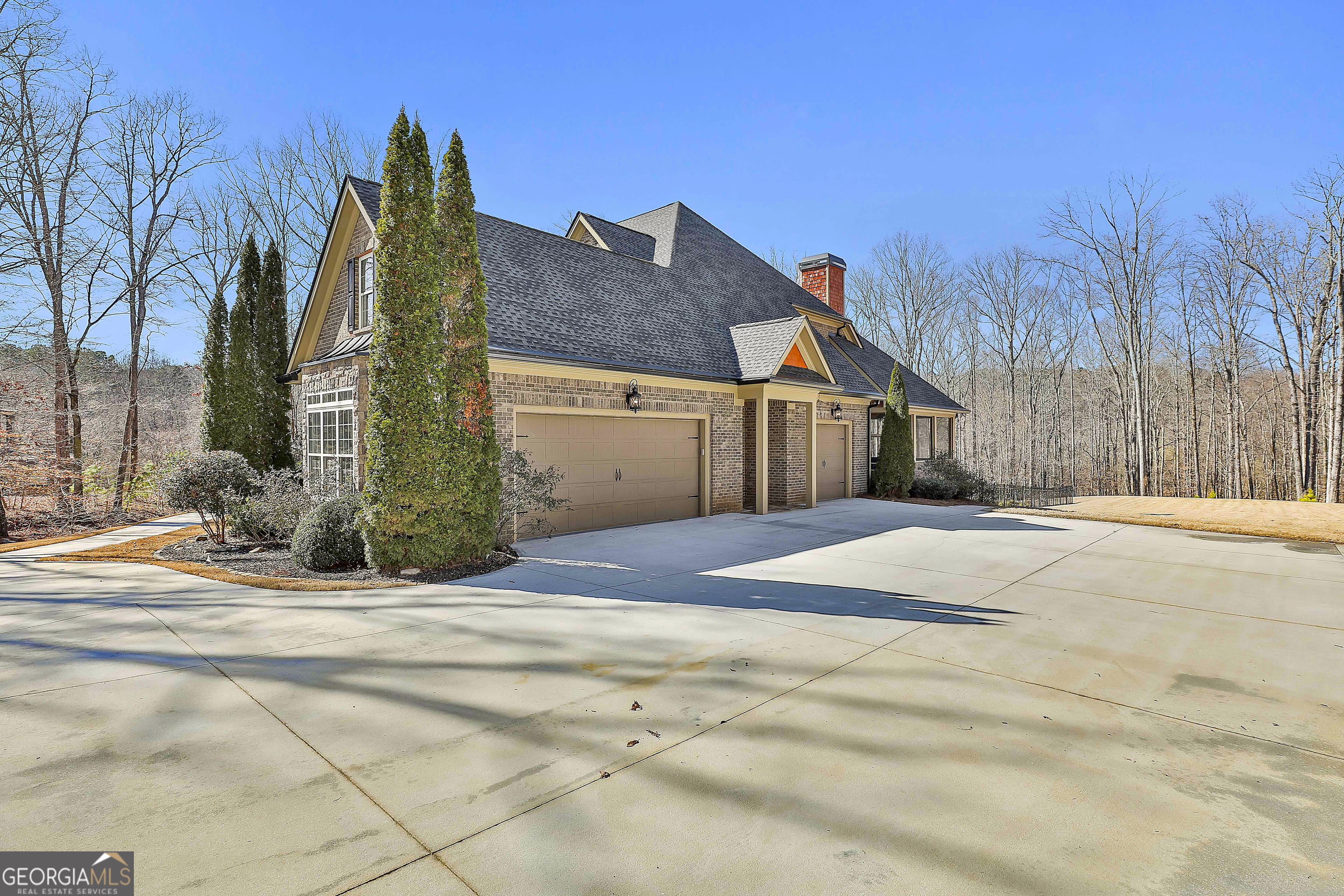 35 Fern Leaf Way Newnan, GA 30265 - Photo 6 of 112 a front view of a house with a yard and garage