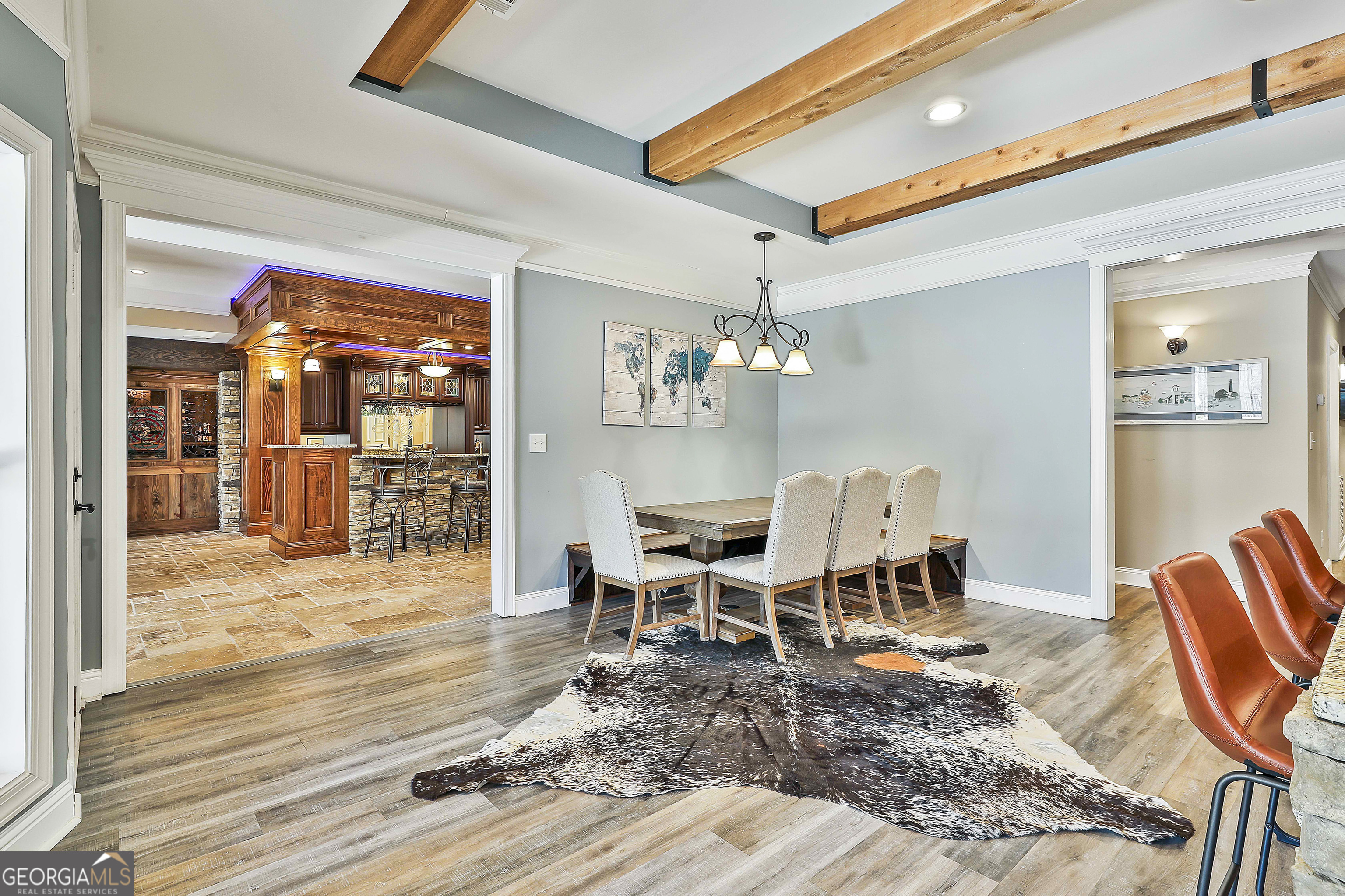 35 Fern Leaf Way Newnan, GA 30265 - Photo 79 of 112 a view of a dining room with furniture wooden floor and chandelier