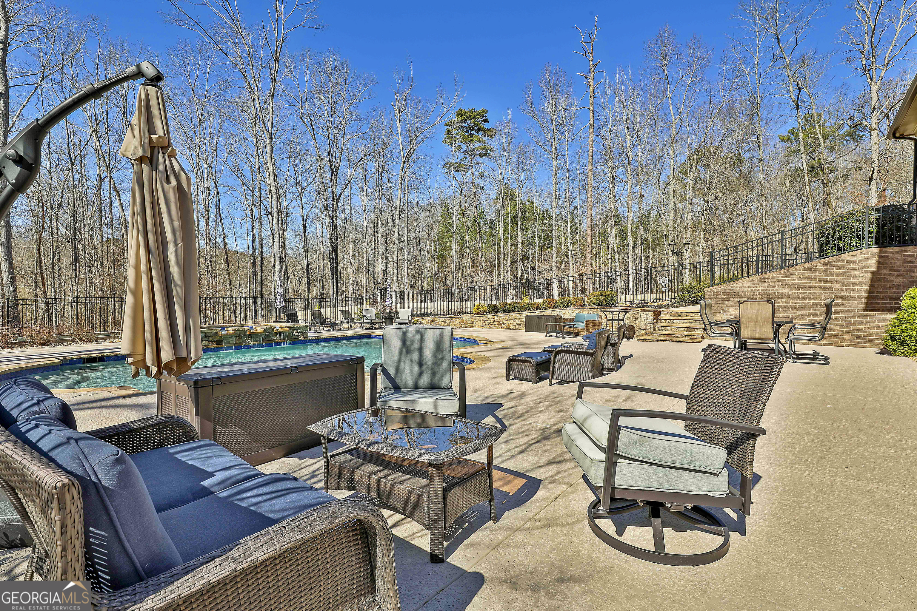 35 Fern Leaf Way Newnan, GA 30265 - Photo 99 of 112 a view of a patio with couches chairs and a fire pit