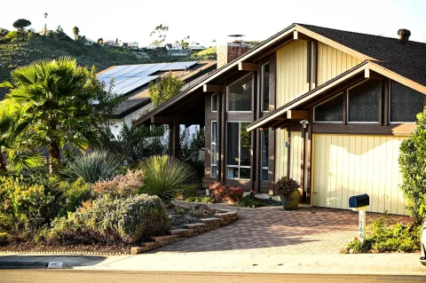 a view of a house with a patio