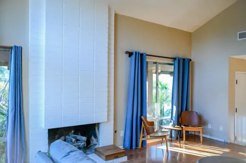 a room with furniture and wooden floor