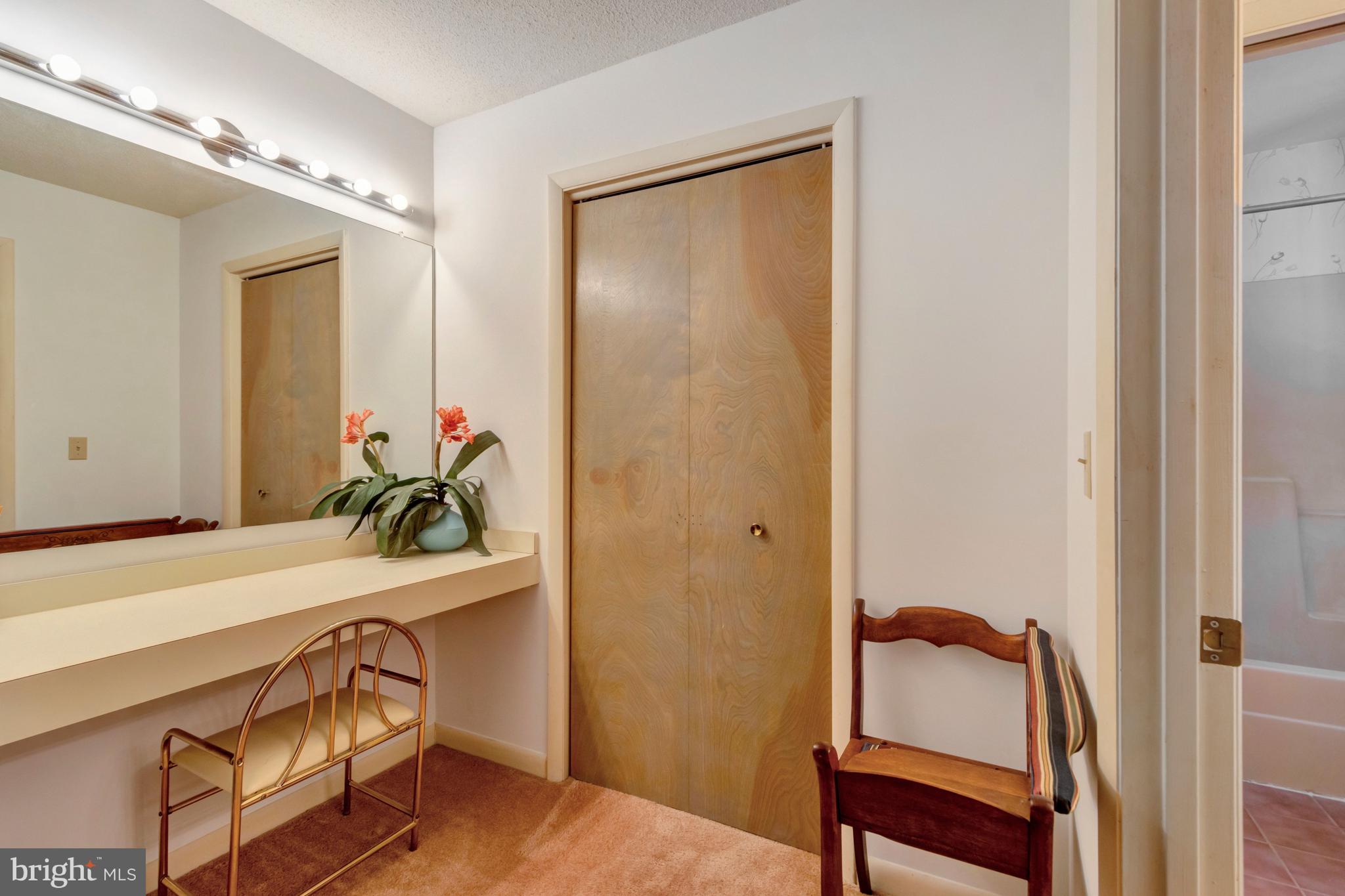 18540 Drayton Hall Road, Unit 6 Lewes, DE 19958 - Photo 32 of 37 Dressing area & walk-in closet