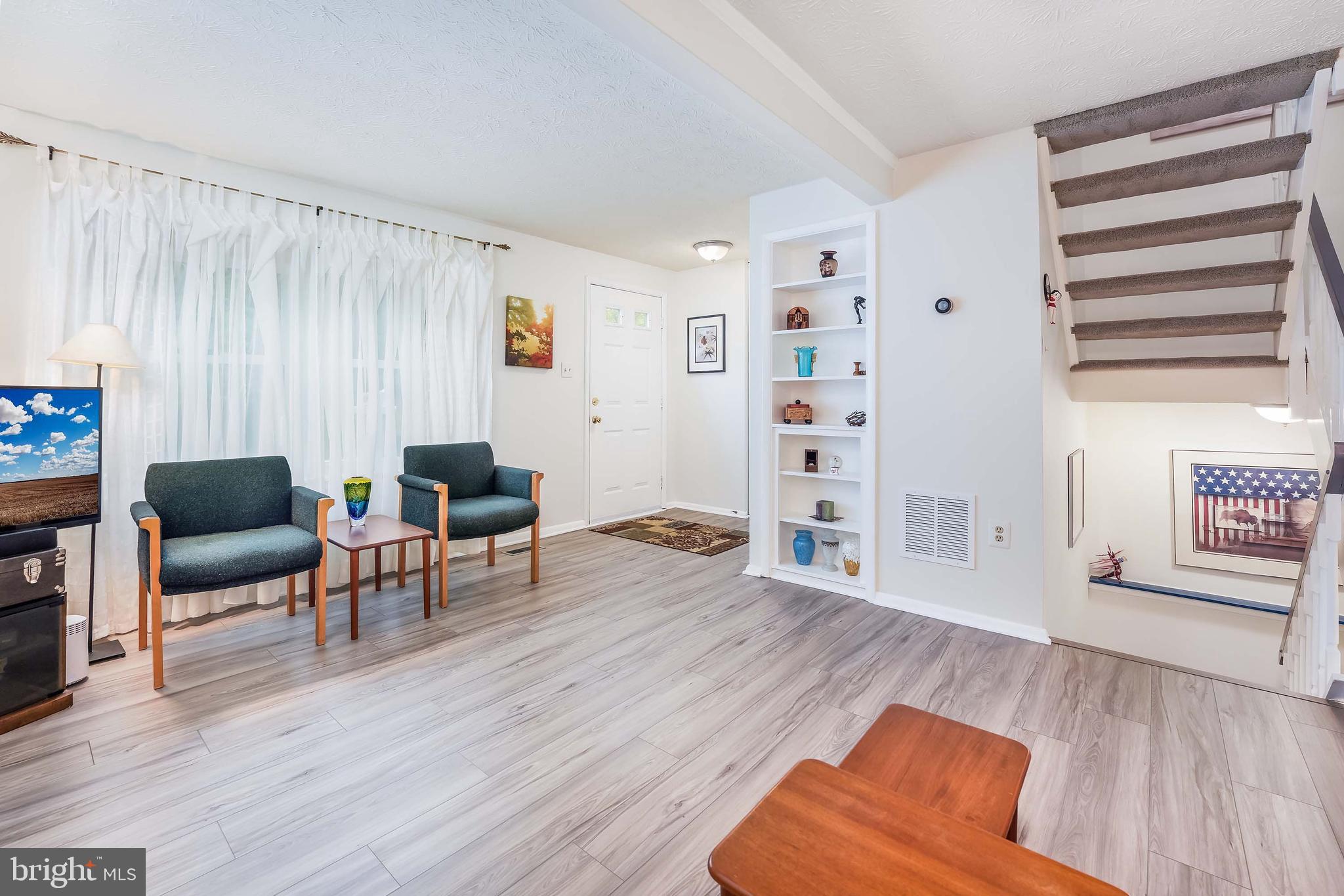 6250 Hillside Road Springfield, VA 22152 - Photo 8 of 27 Built-ins and open stairway