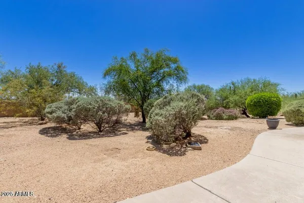 a view of a backyard of a house