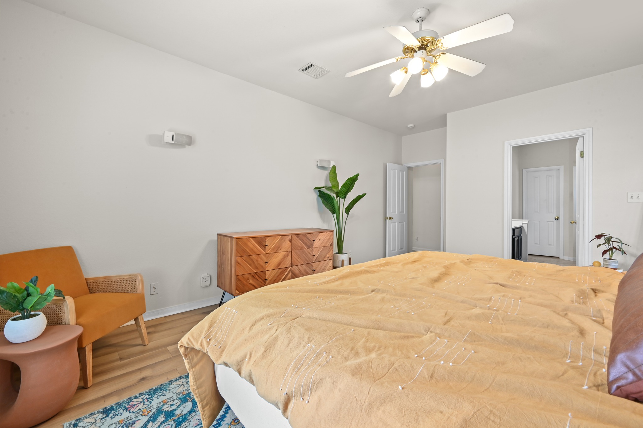 5888 Fergus Kyle, TX 78640 - Photo 14 of 40 Relax in this tranquil bedroom, offering ample space and serene ambiance for restful nights.