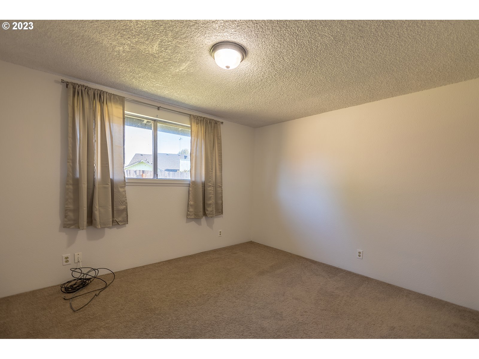 5326 B Street Springfield, OR 97478 - Photo 13 of 18 a view of an empty room and window