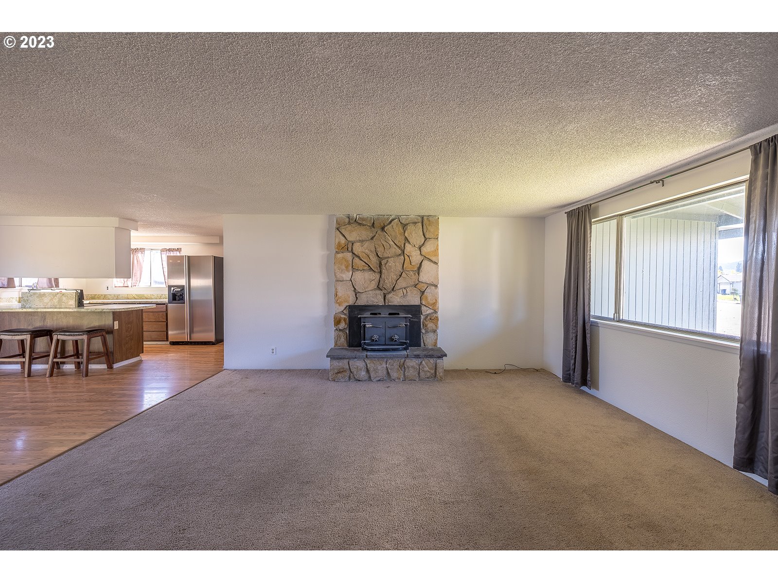 5326 B Street Springfield, OR 97478 - Photo 3 of 18 a living room with furniture and a table