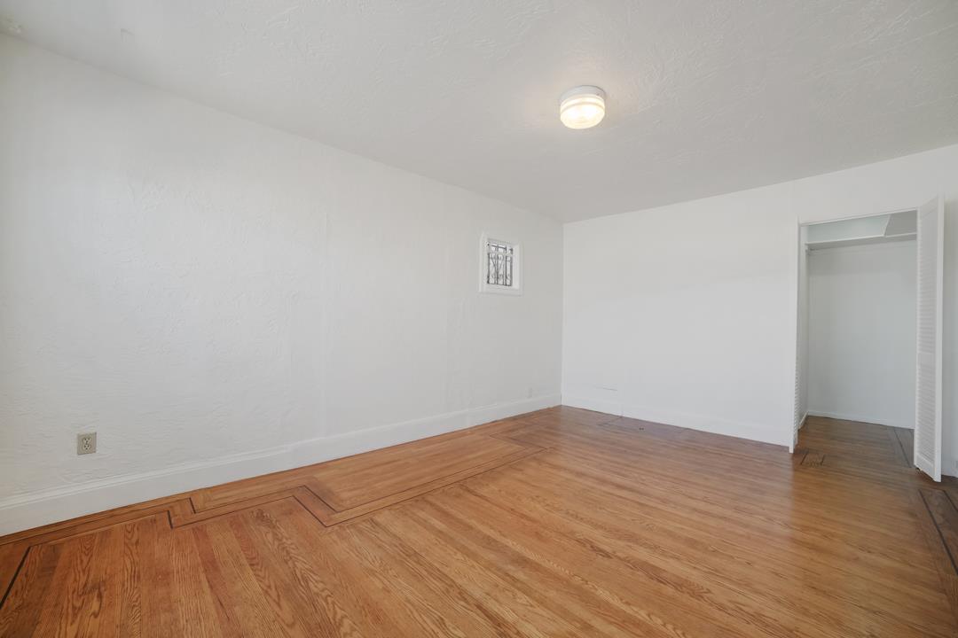 2276 35th Avenue Oakland, CA 94601 - Photo 5 of 32 wooden floor in a room