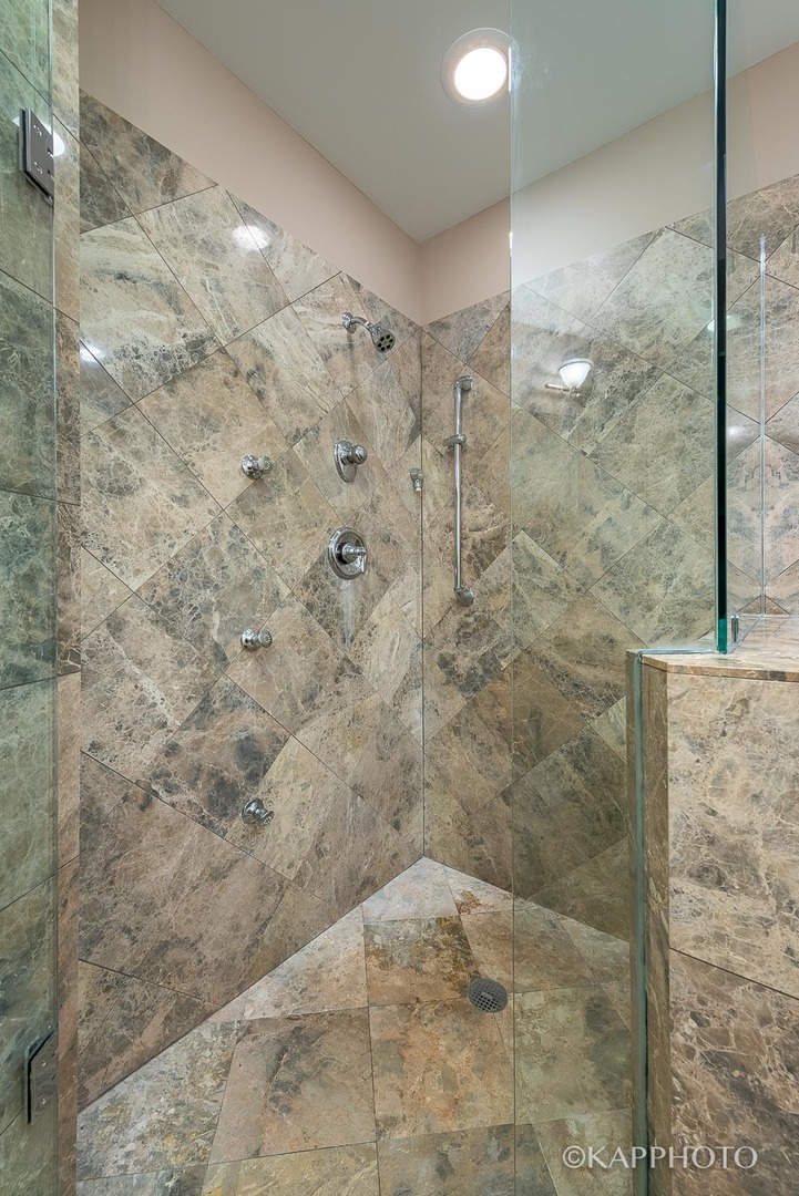 35 South Racine Avenue, Unit 2SE Chicago, IL 60607 - Photo 22 of 27 a bathroom with a shower