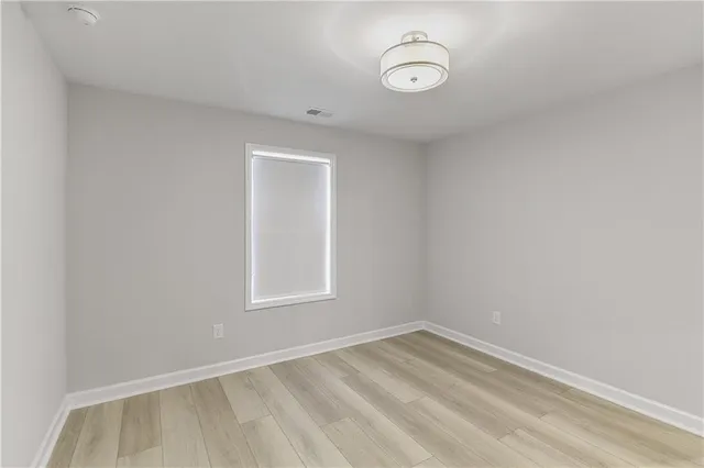 an empty room with a window