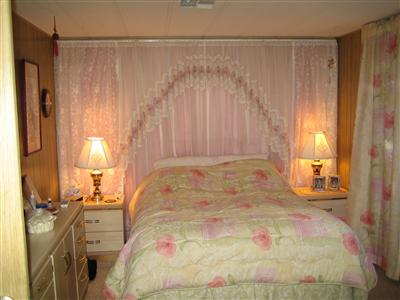 26 Bluejay Drive, Unit 26 Santa Rosa, CA 95409 - Photo 4 of 4 a bedroom with a bed and a window