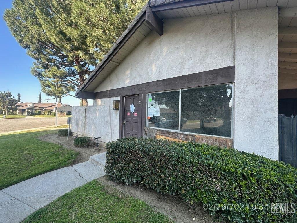 Undisclosed Address Bakersfield, CA 93301 - Photo 3 of 8 a view of a backyard with garden