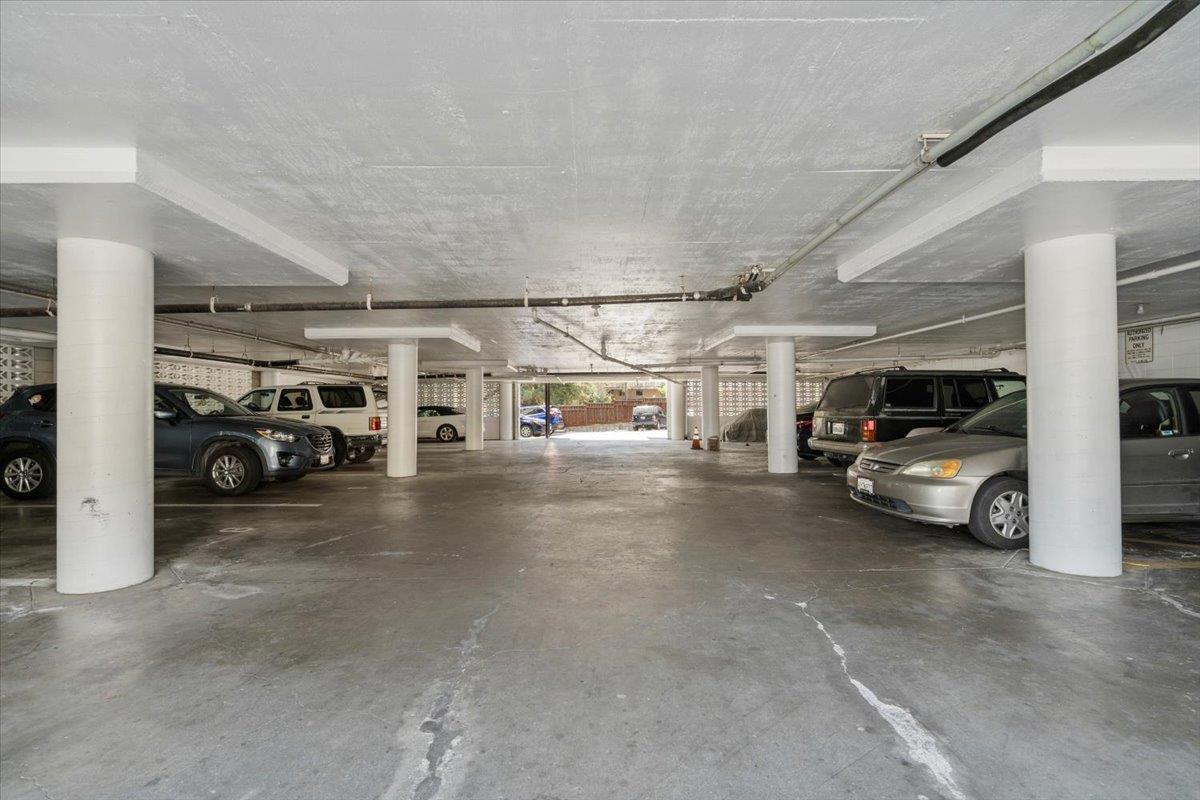 616 Canyon Road Redwood City, CA 94062 - Photo 9 of 11 a view of parking garage with cars parked