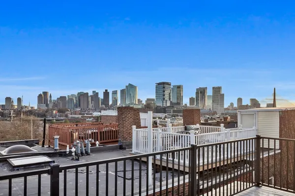 a view of a city with tall buildings