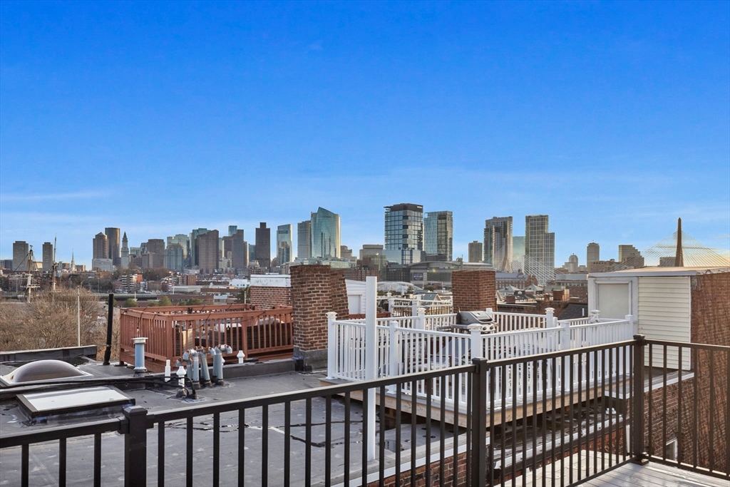 12 Prospect Street, Unit 2 Boston, MA 02129 - Photo 21 of 27 a view of a city with tall buildings