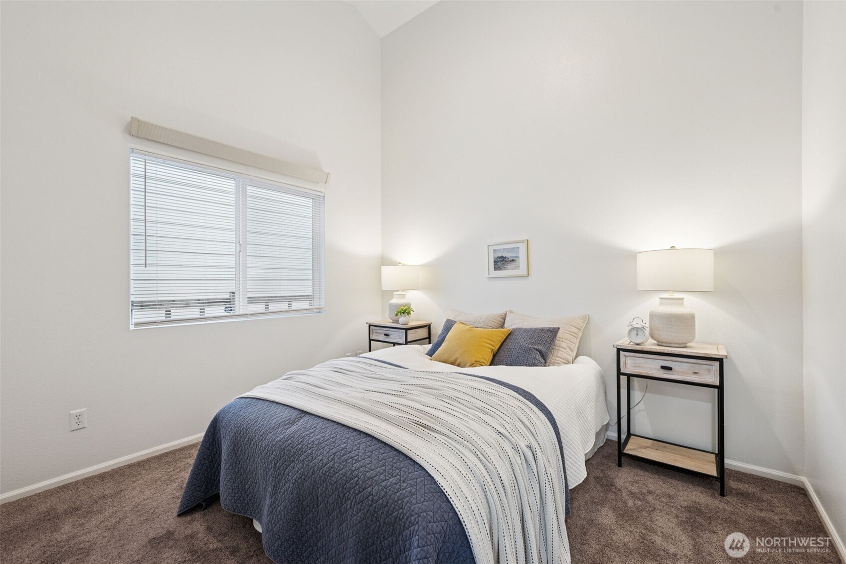 6509 Indiana Street Southeast Olympia, WA 98513 - Photo 15 of 24 a bedroom with a bed and a window
