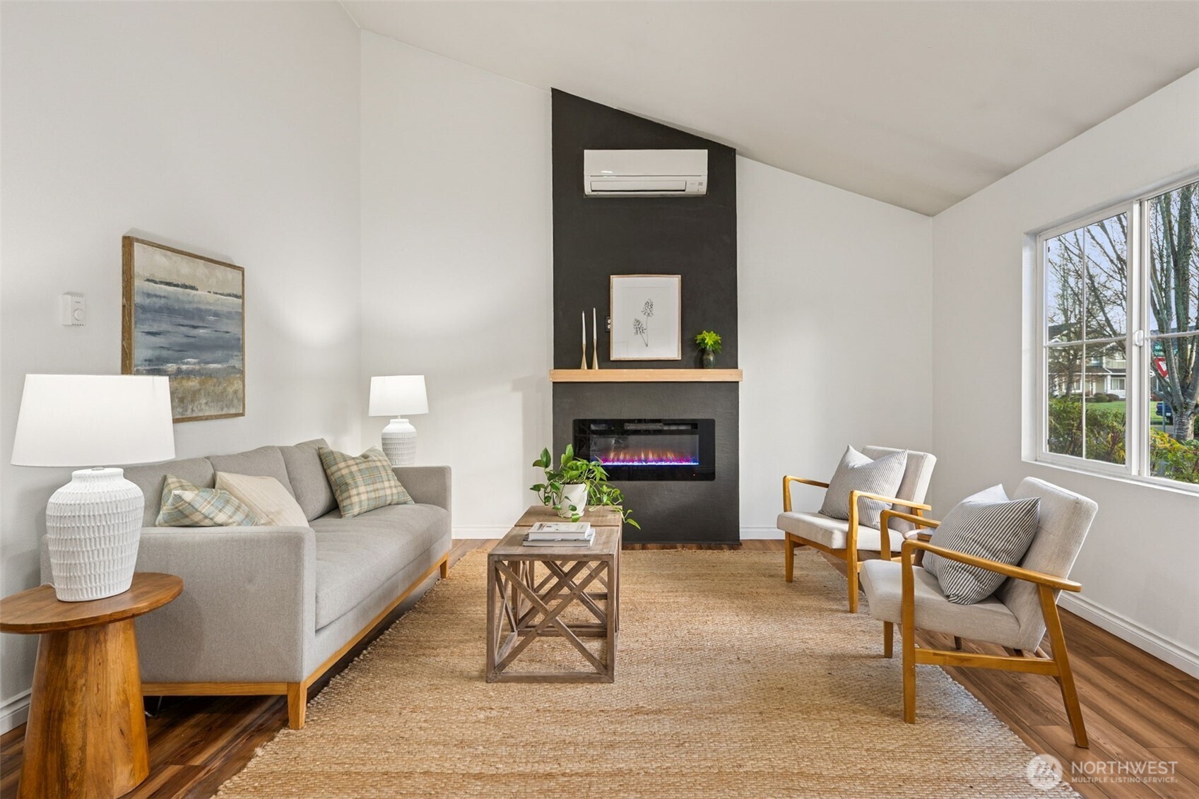 6509 Indiana Street Southeast Olympia, WA 98513 - Photo 5 of 24 a living room with furniture and a fireplace