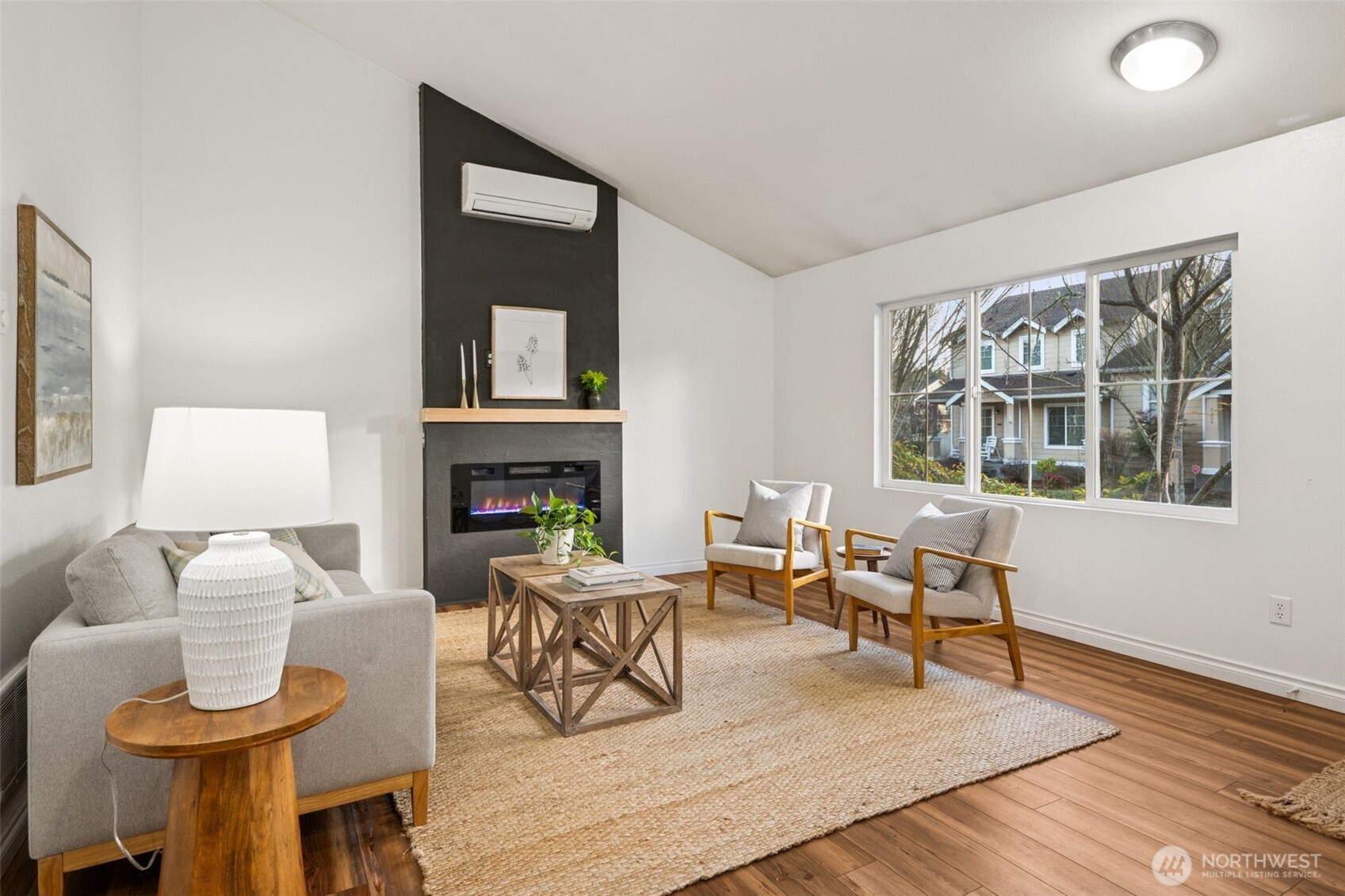 6509 Indiana Street Southeast Olympia, WA 98513 - Photo 7 of 24 a living room with furniture and a fireplace