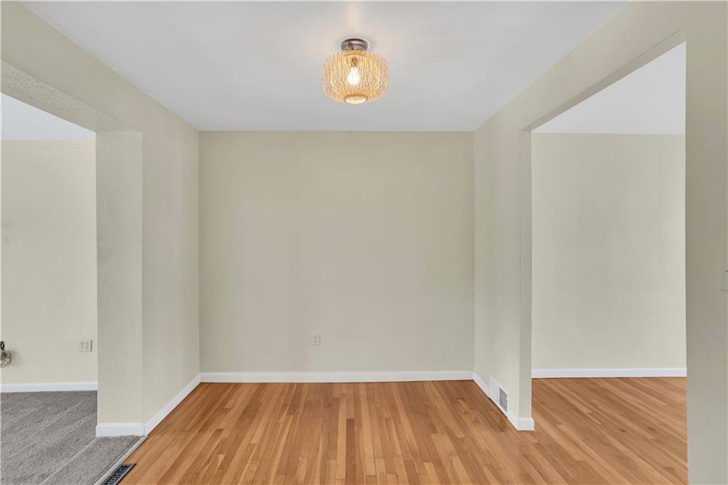 616 Brightberry Road Monroeville, PA 15146 - Photo 9 of 35 Beautiful Wood Floors Flow From the Living Room into 9x8 Dining Room off Kitchen.