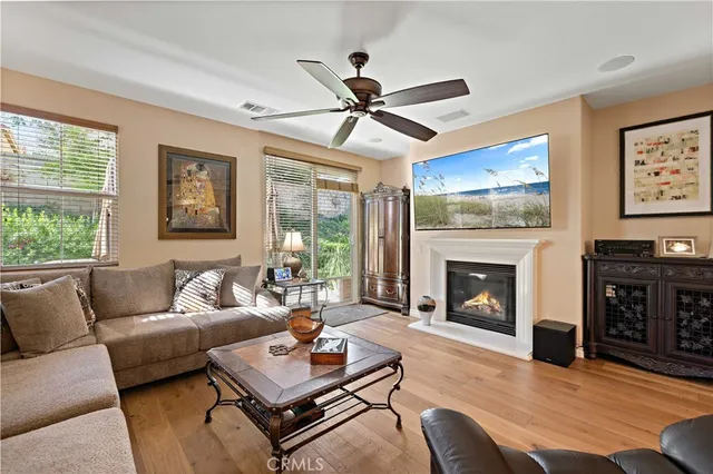 a spacious bathroom with a bathtub shower sink double and mirror