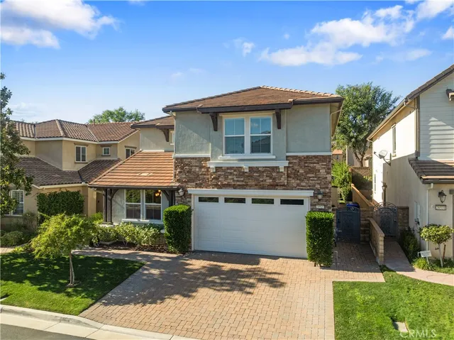 a front view of a house with a porch