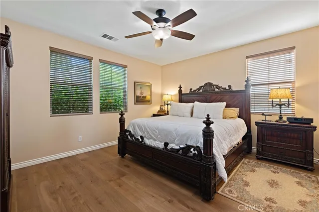 a view of a workspace with furniture and a mirror