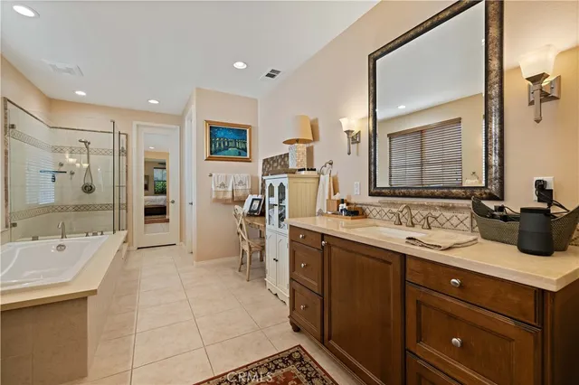 a view of a workspace with furniture and wooden floor