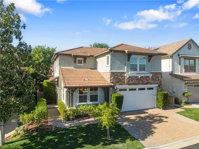 a front view of a house with a porch