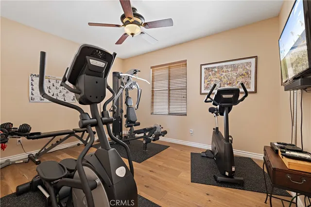 a bed room with a bed and a chandelier