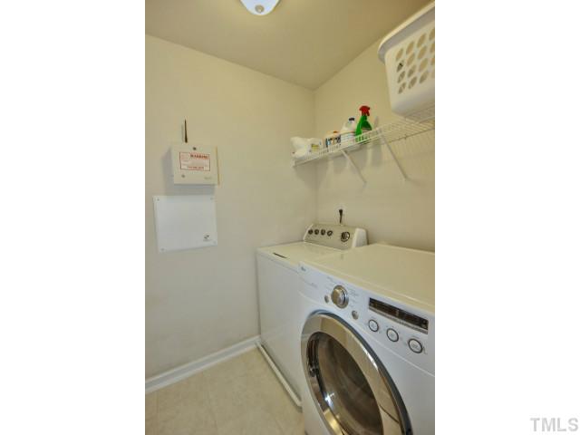 7404 Lagrange Drive Raleigh, NC 27613 - Photo 18 of 25 This second floor utility room makes putting away laundry that much closer and easier!